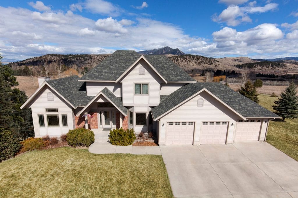 Malarkey Legacy Scotchgard architectural shingles on a large two-storey home
